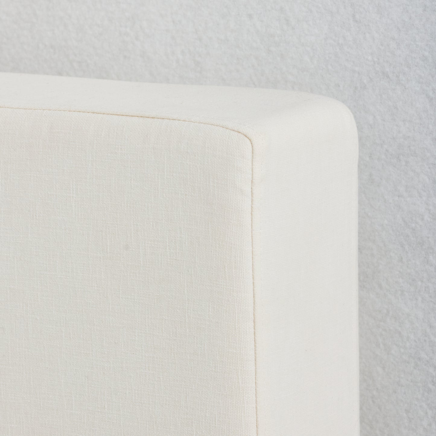 Custom-made Coastal Bed with oversized headboard, styled in serene neutral fabric for a relaxed, luxurious bedroom aesthetic.