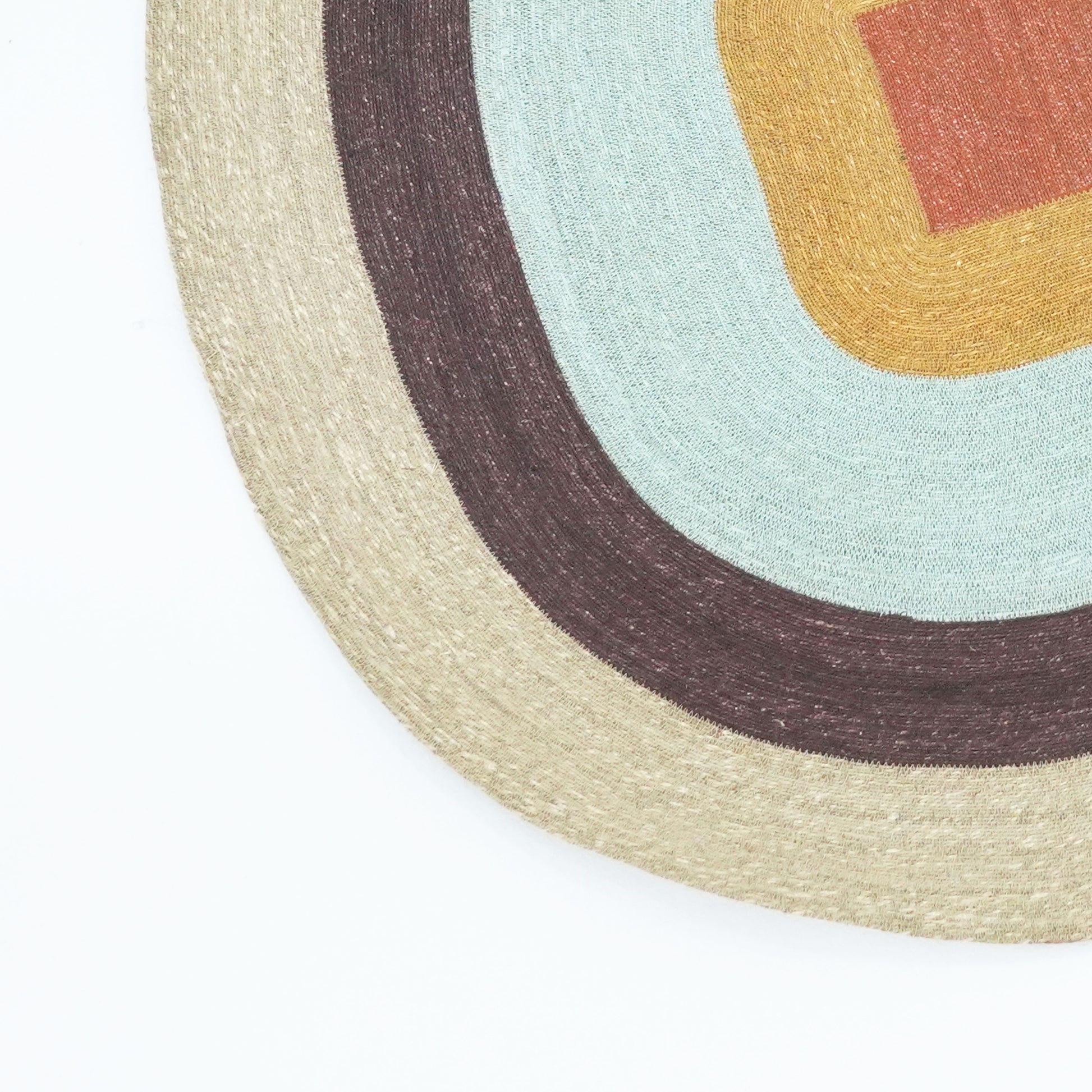 Handmade Kai Seagrass Collection Manu Rug – multicolour seagrass rug, sustainable and artisanal design from Tribe Dubai.