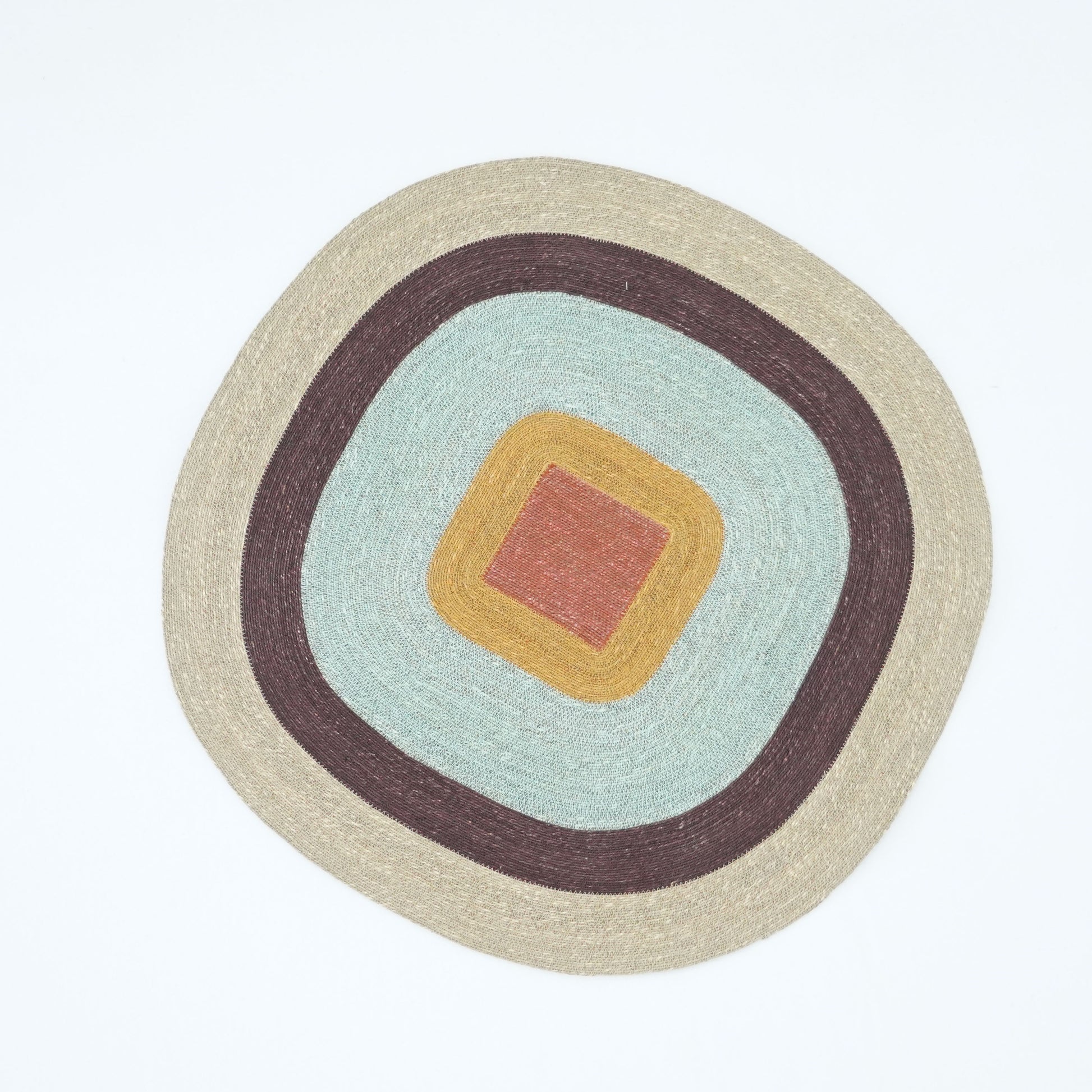Handmade Kai Seagrass Collection Manu Rug – multicolour seagrass rug, sustainable and artisanal design from Tribe Dubai.