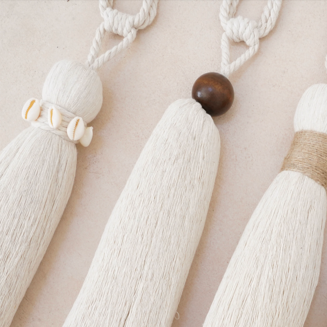 Ivory and natural handcrafted tassel from the Hilo Collection, made with cotton thread and jute