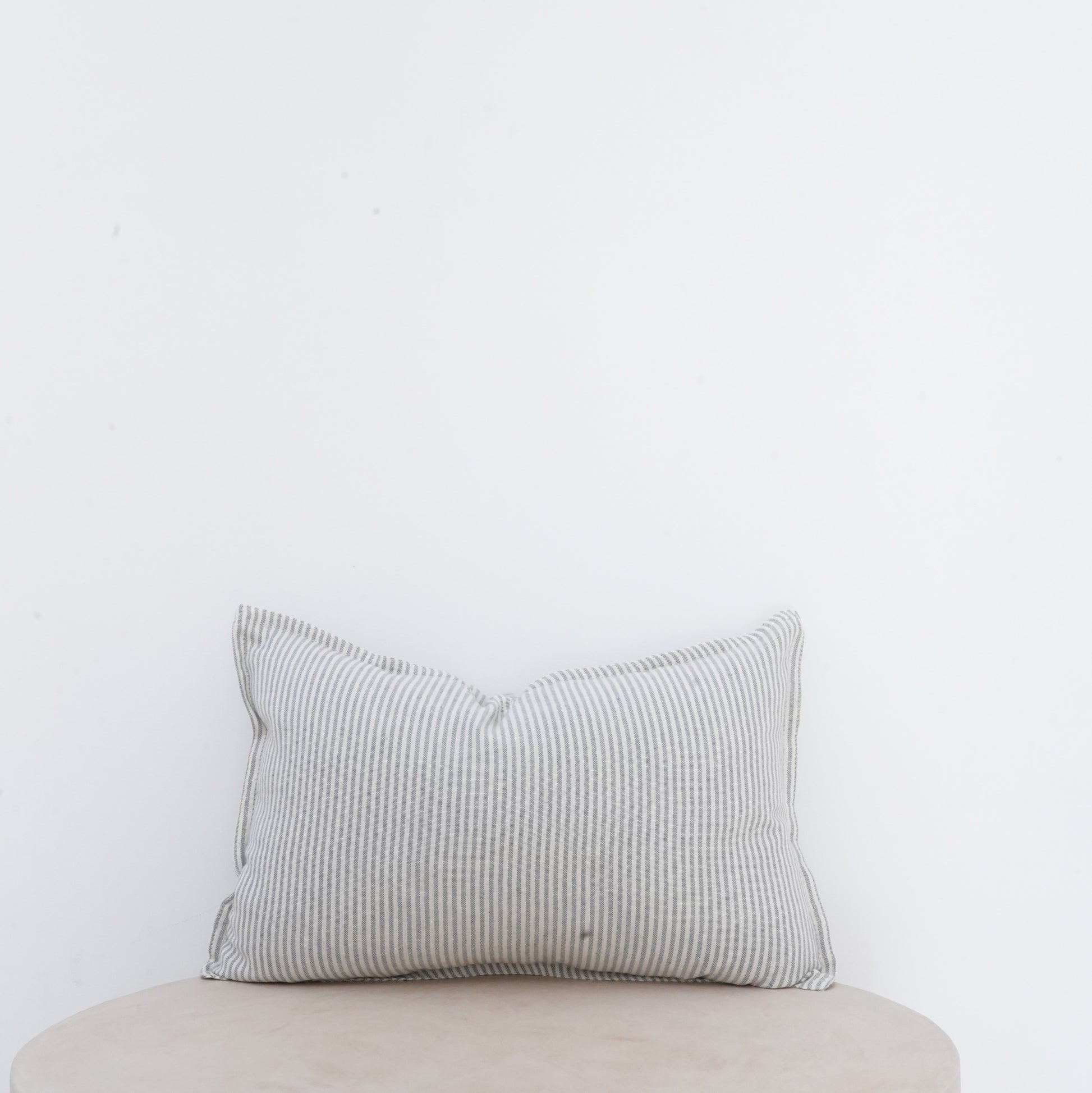 Mistral linen cushion with French seam and classic elegance.