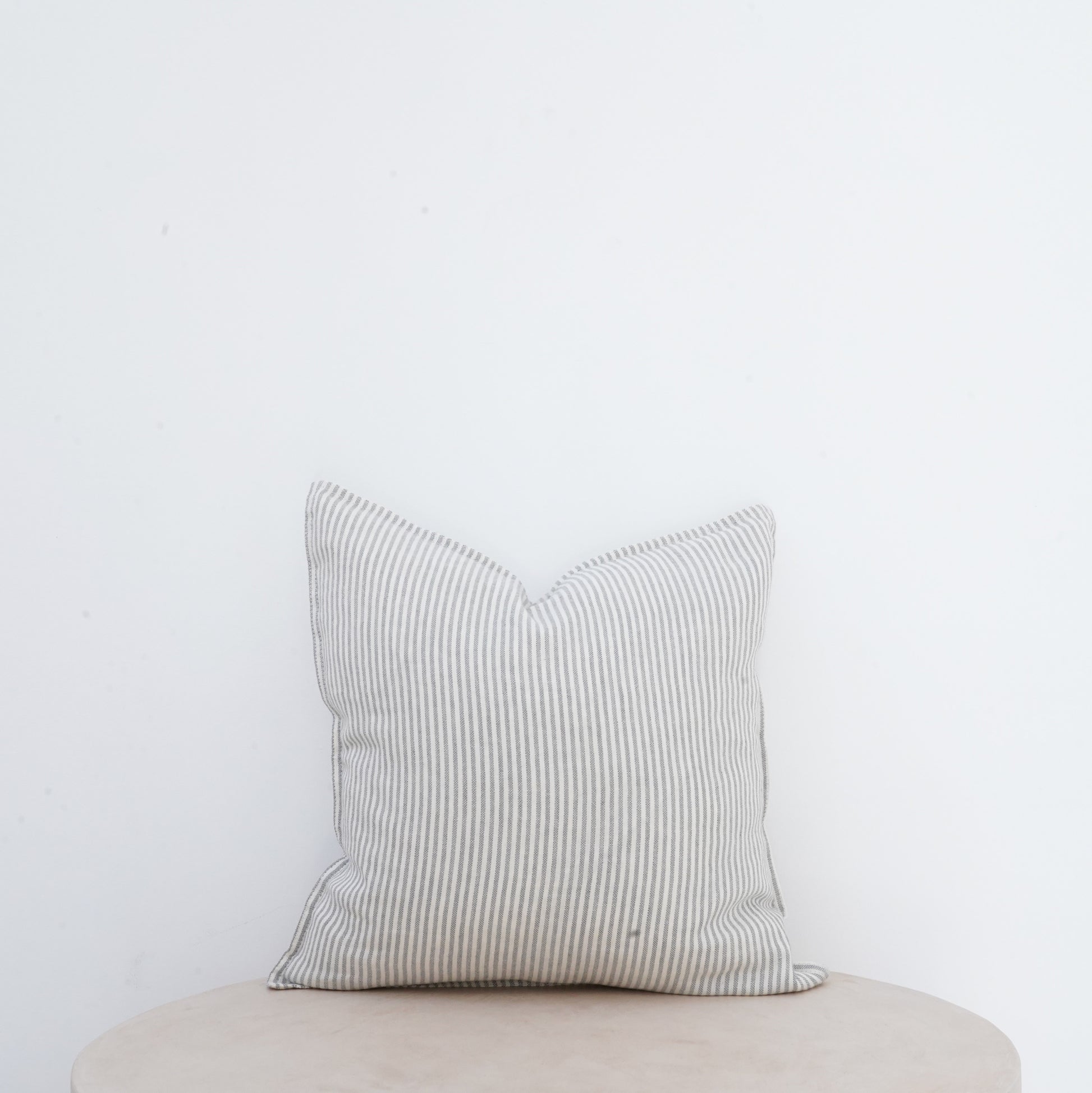 Mistral linen cushion with French seam and classic elegance.