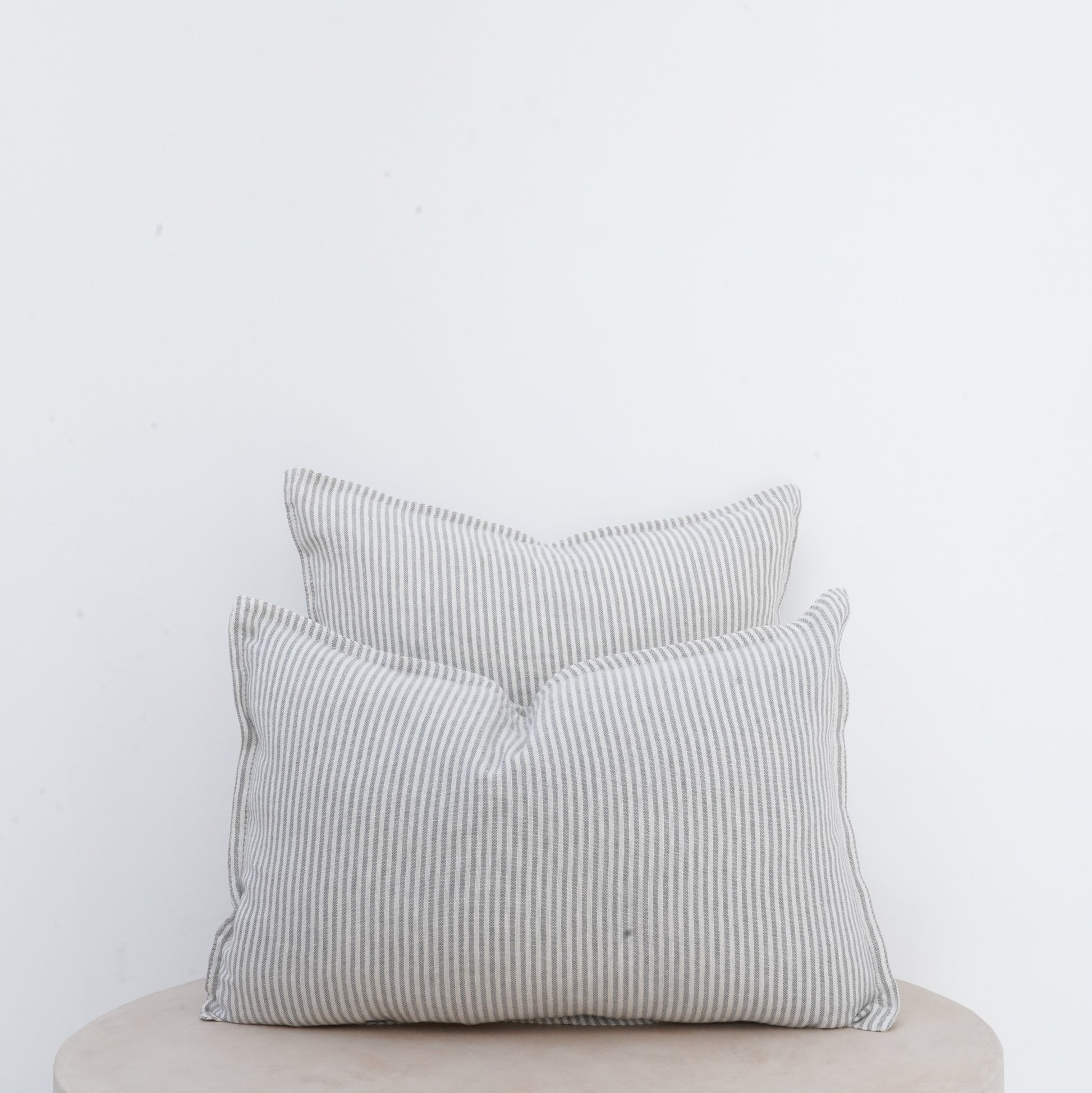 Mistral linen cushion with French seam and classic elegance.