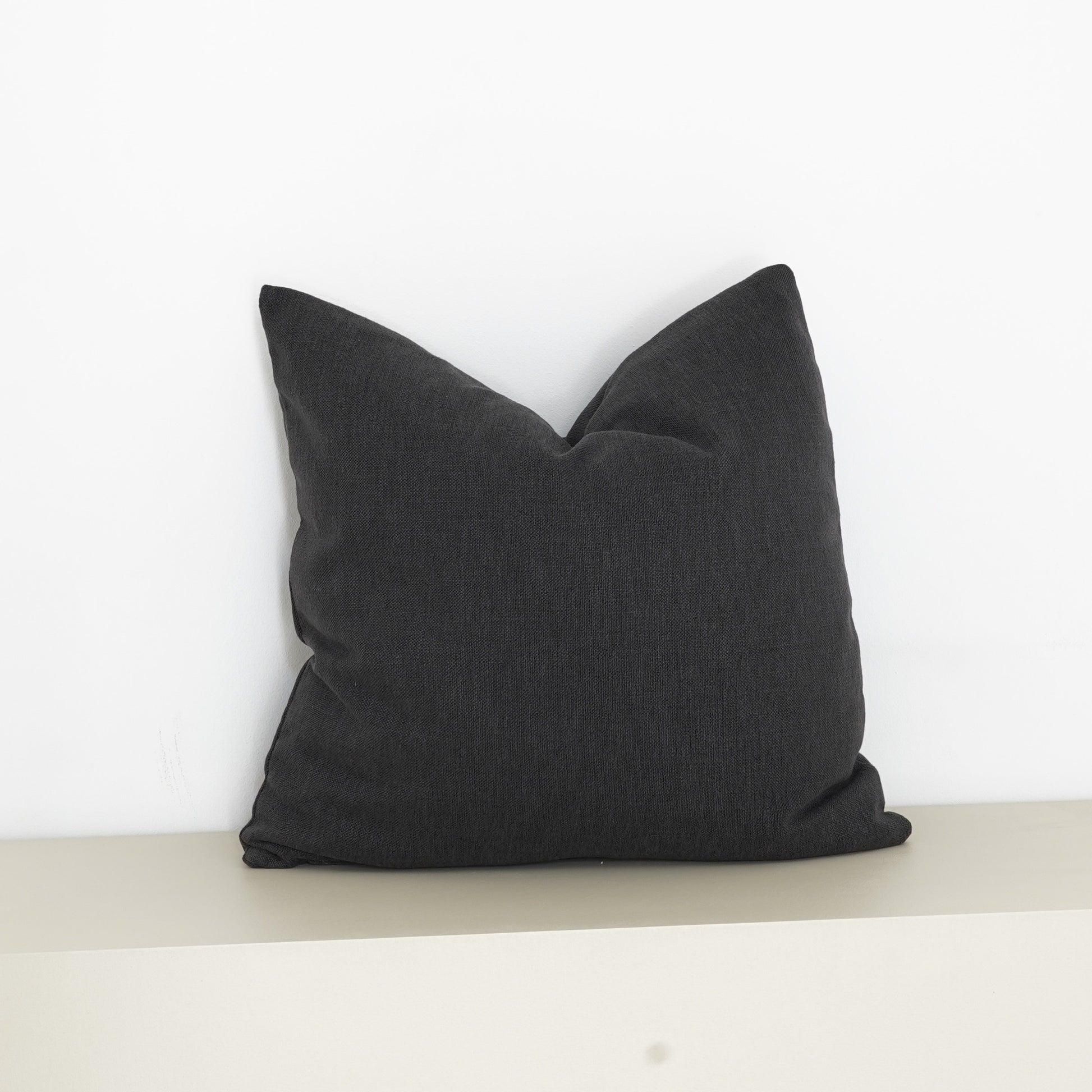 Charcoal Tribal Chic cushion in bold monochrome design.