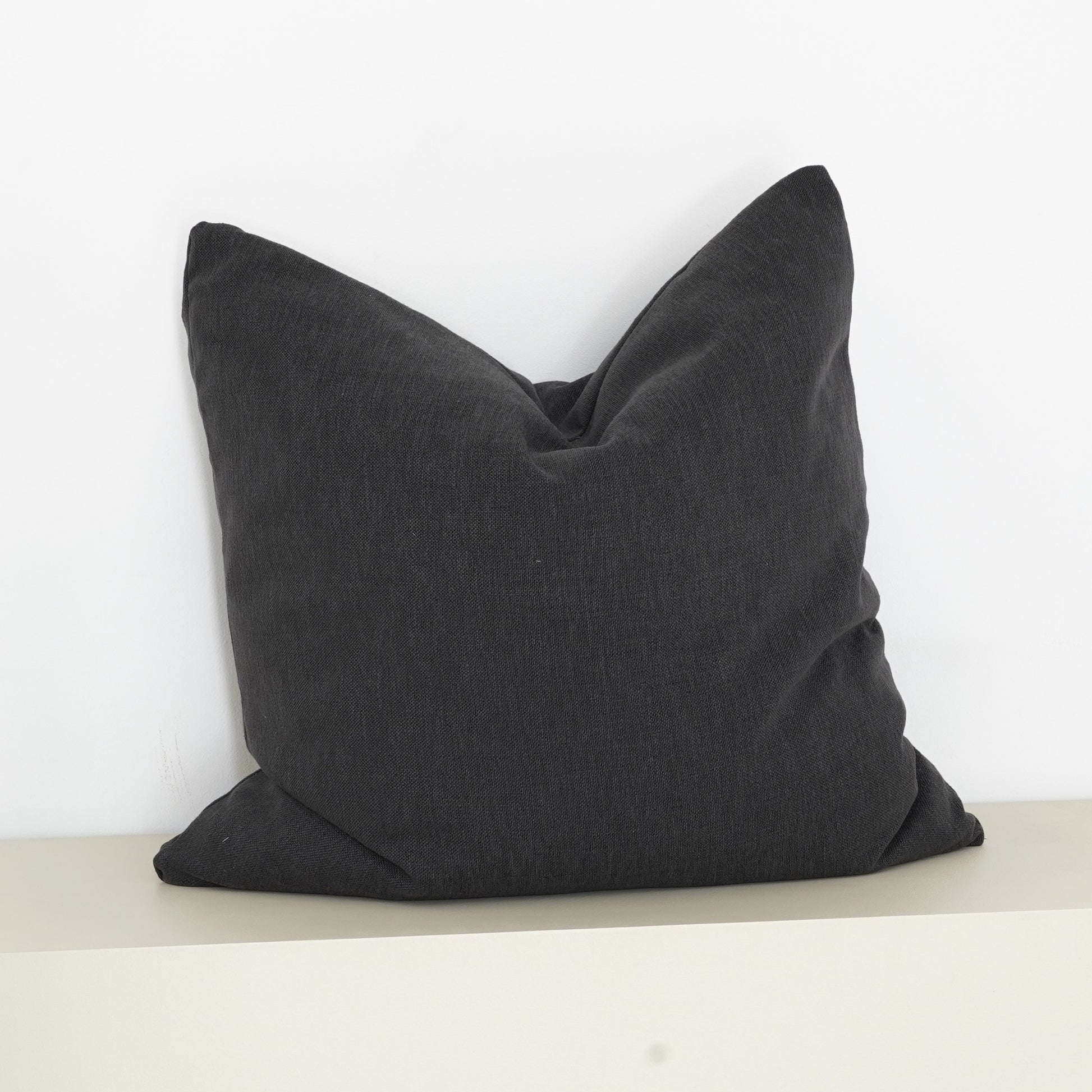 Charcoal Tribal Chic cushion in bold monochrome design.
