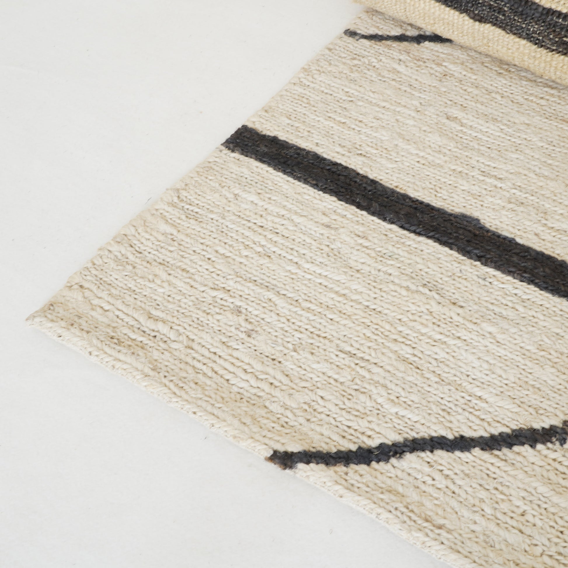 Ivory and charcoal jute rug, eco-friendly indoor rug design - Tribe Rugs Collection
