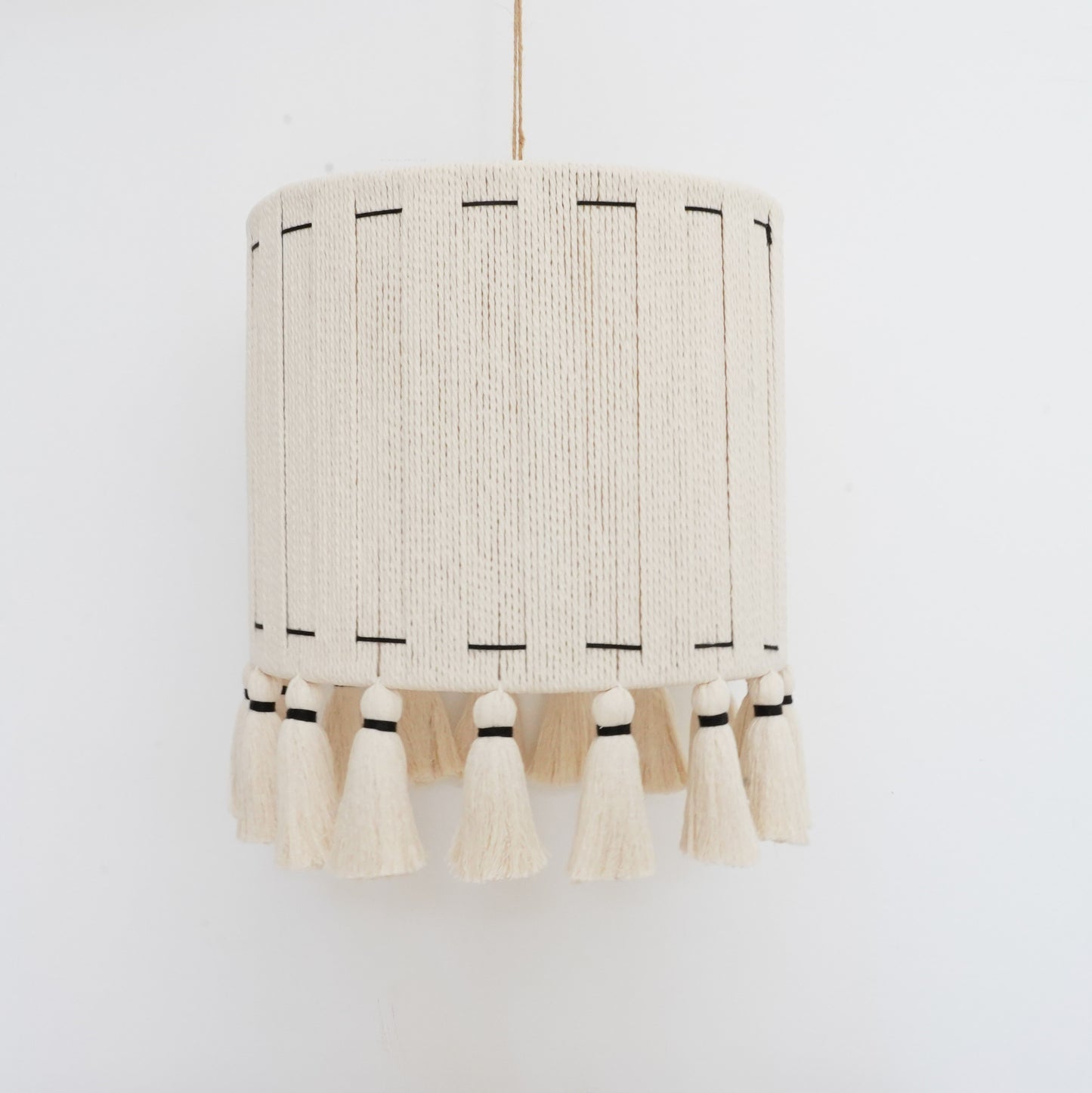 Ivory and black handcrafted cotton tassel and lampshade from the Hilo Collection