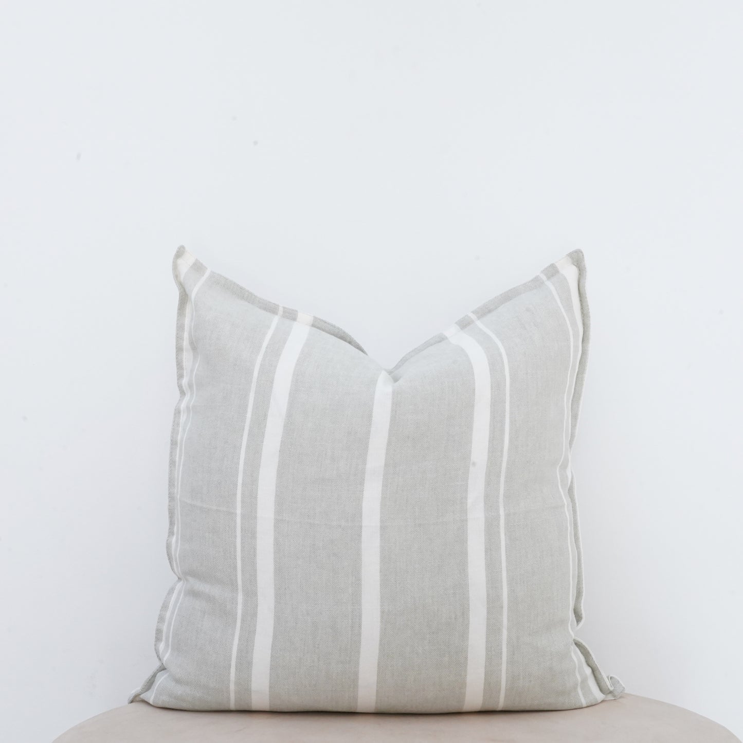 Willow linen cushion with French seam and soft natural finish.