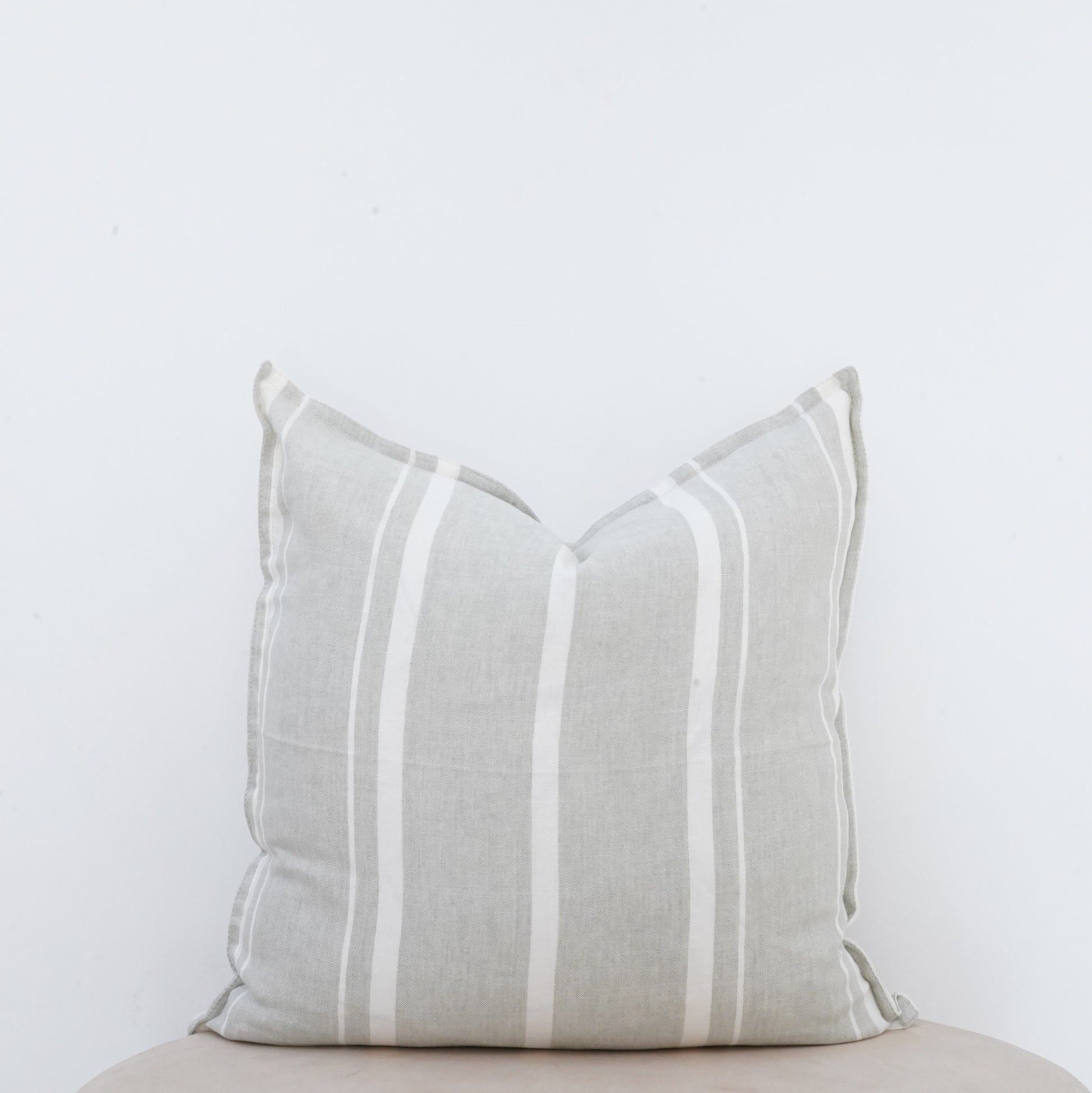 Willow linen cushion with French seam and soft natural finish.
