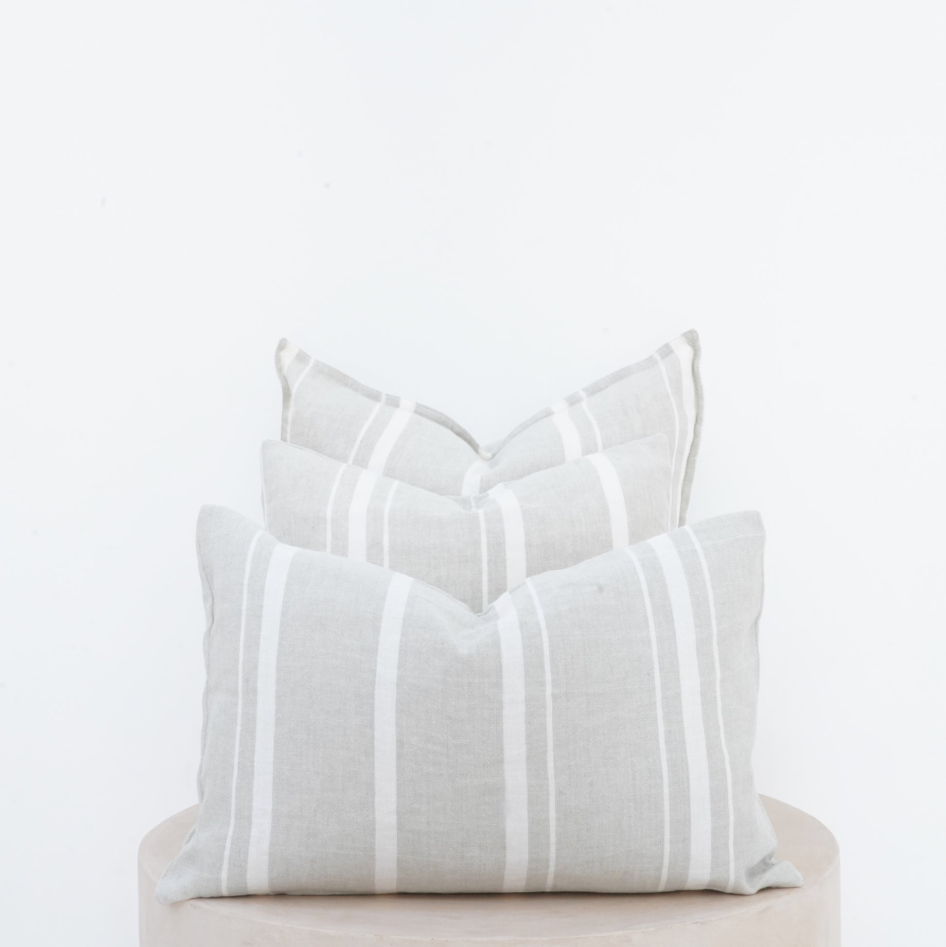 Willow linen cushion with French seam and soft natural finish.