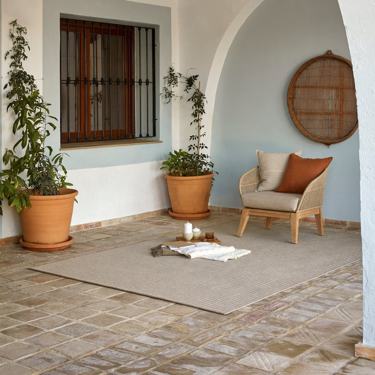 Carmel Indoor/Outdoor Rug – eco-friendly recycled plastic rug in coconut white, durable, versatile, and sustainable design by Tribe Dubai.