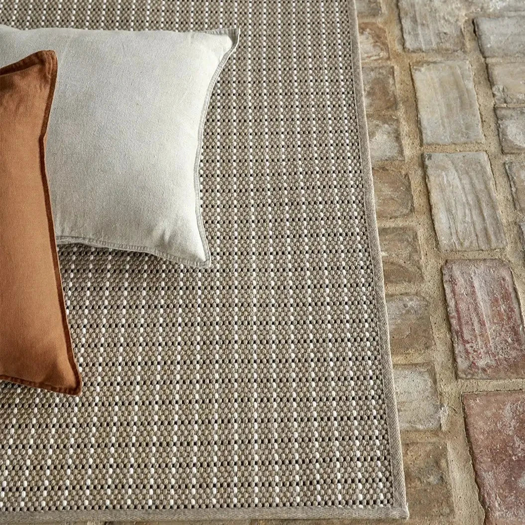 Carmel Indoor/Outdoor Rug – eco-friendly recycled plastic rug in coconut white, durable, versatile, and sustainable design by Tribe Dubai.