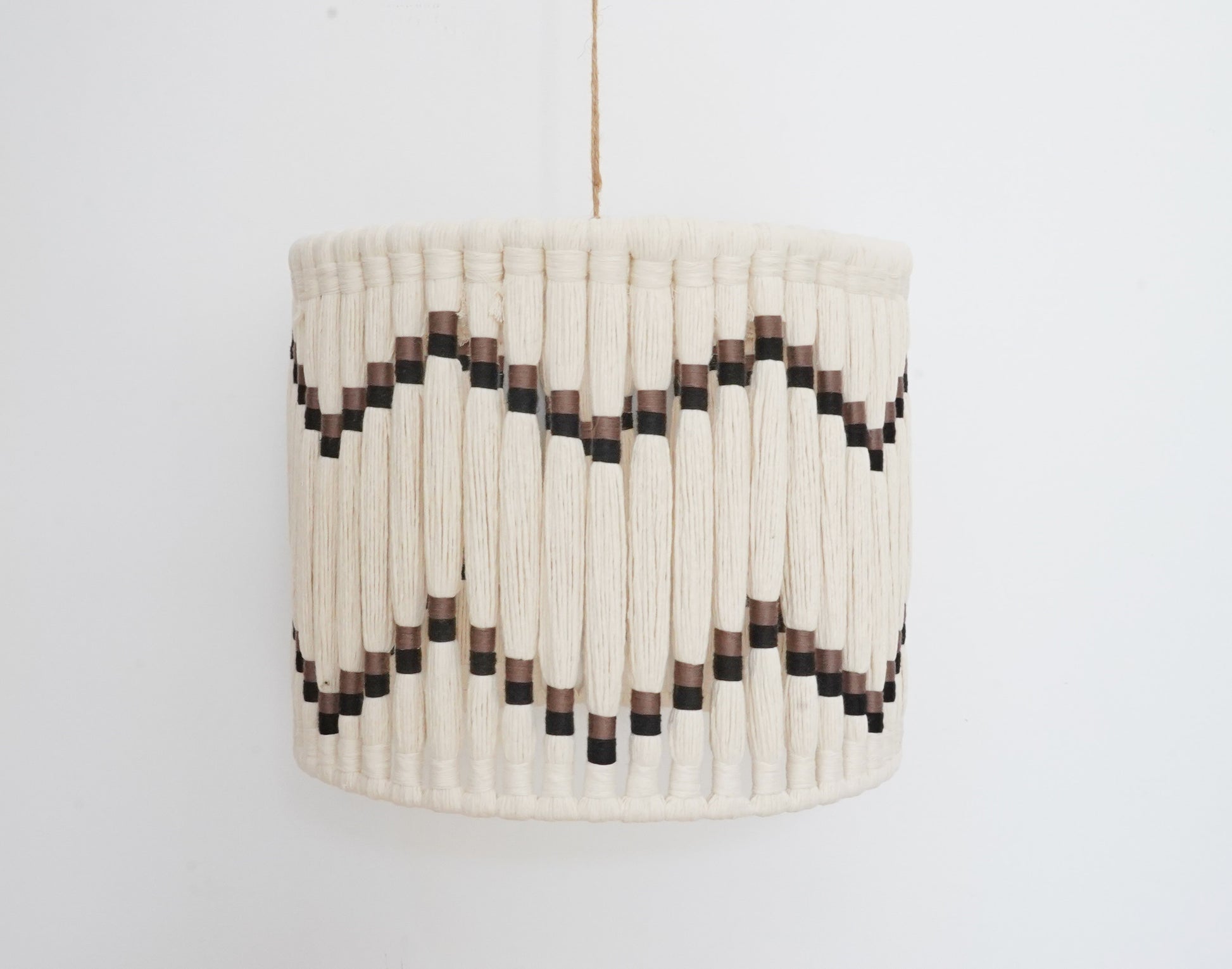 Handcrafted ivory and black tassel and lampshade from the Hilo Collection, made of fine cotton thread