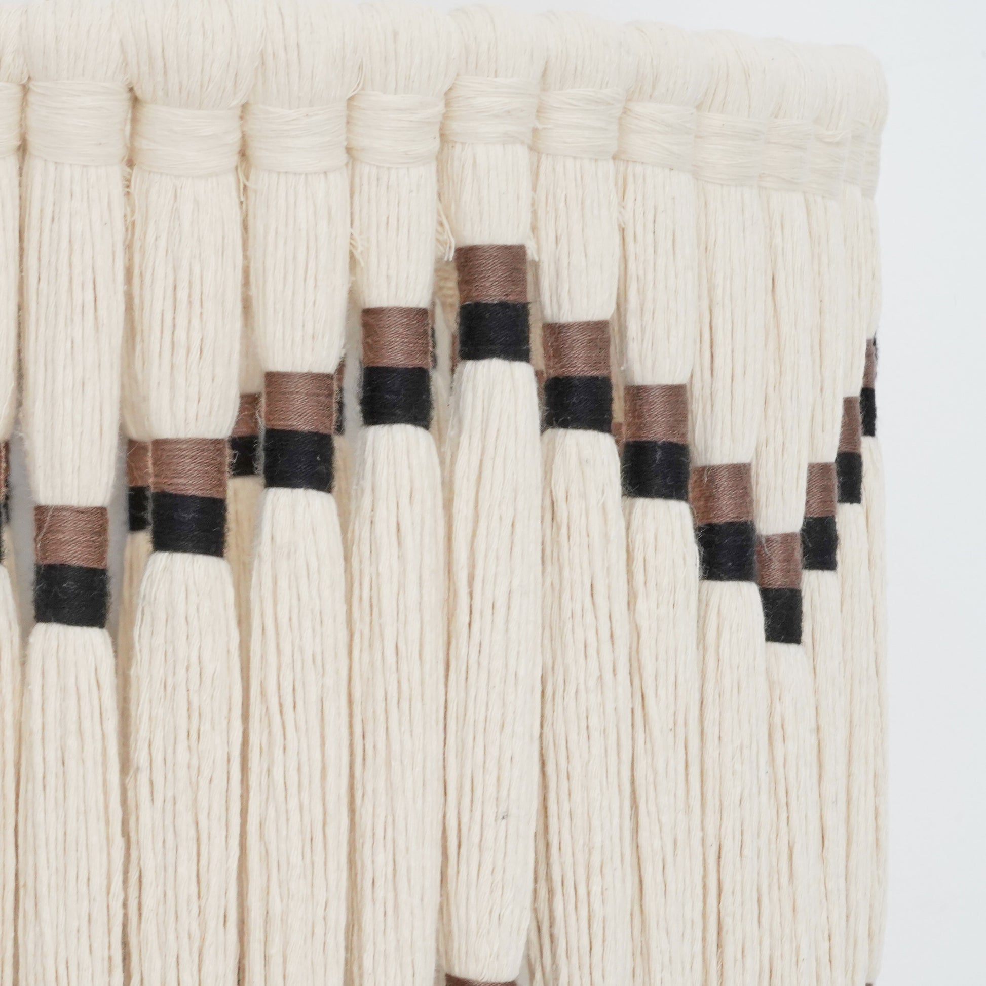 Handcrafted ivory and black tassel and lampshade from the Hilo Collection, made of fine cotton thread