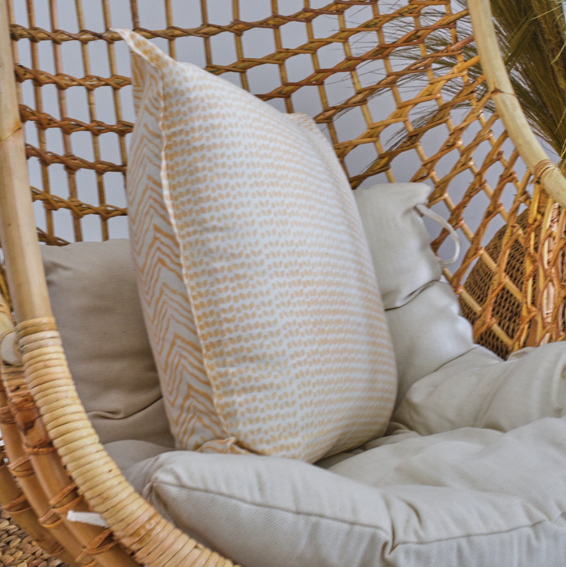 Peach hand-block printed Khushi mattress with included cushion inner.