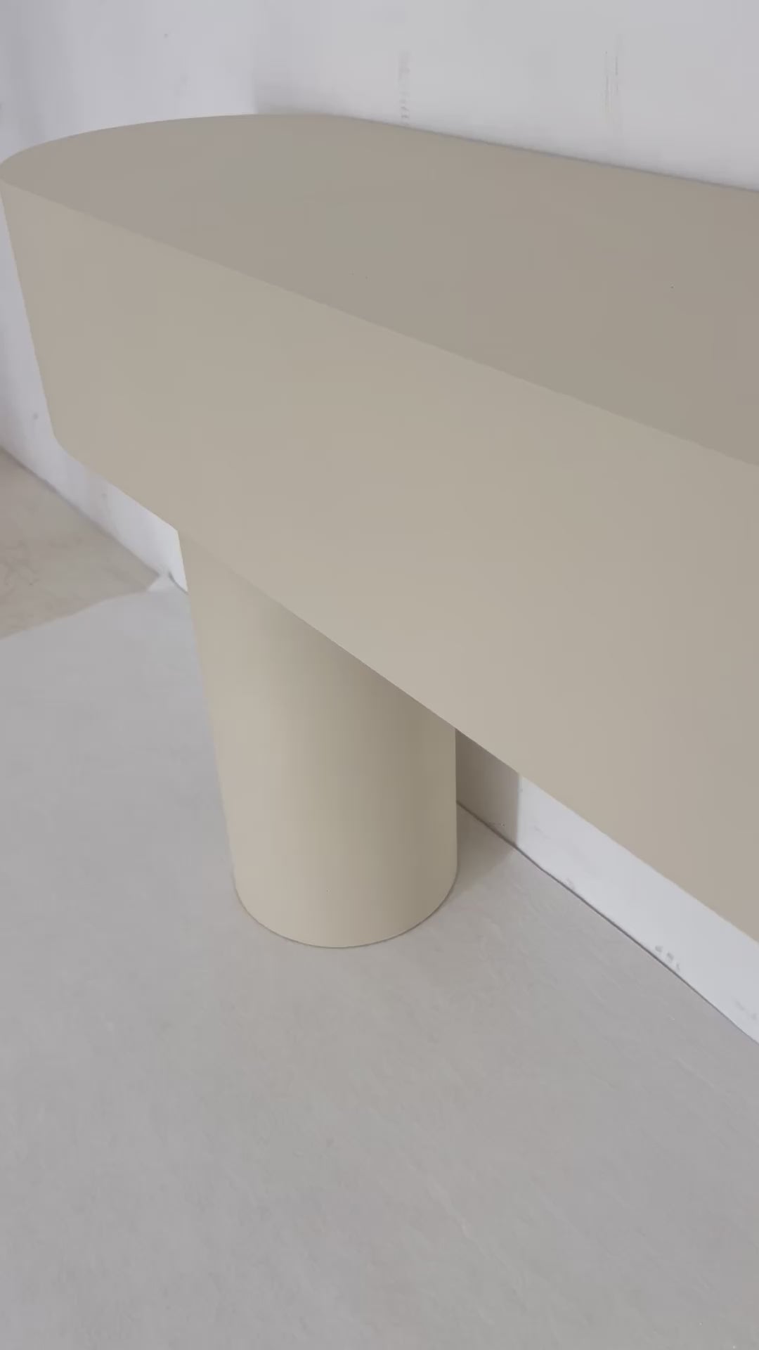 Minimalist microcement console table with smooth finish and clean lines, ideal for modern interiors.