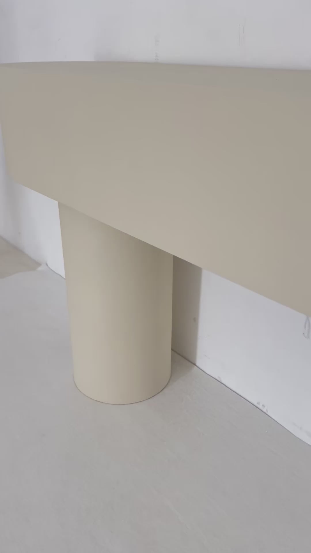Minimalist microcement console table with smooth finish and clean lines, ideal for modern interiors.